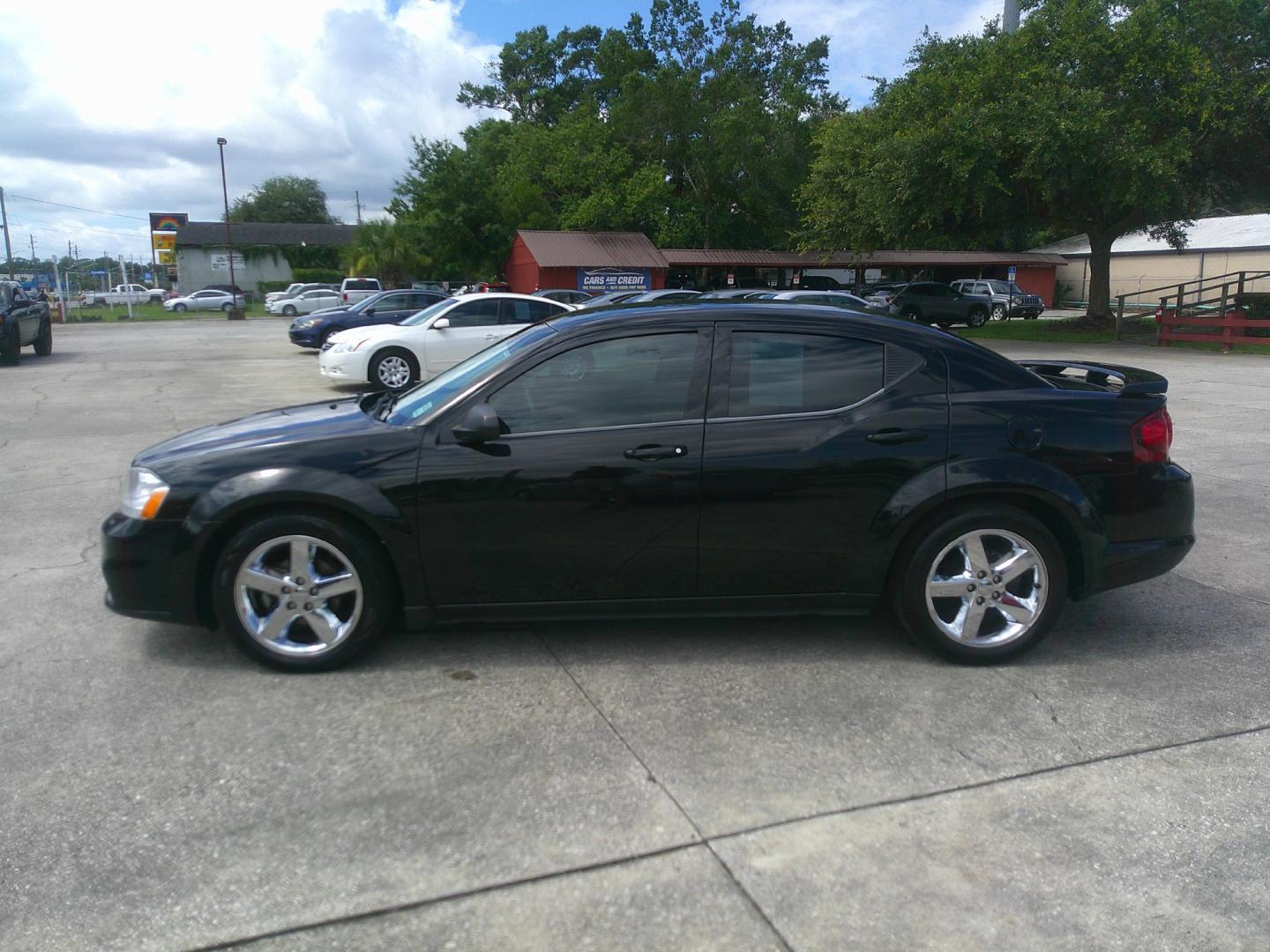 2013 BLACK DODGE AVENGER SE (1C3CDZAG5DN) , located at 1200 Cassat Avenue, Jacksonville, FL, 32205, (904) 695-1885, 30.302404, -81.731033 - Photo#1